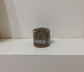 Orgonite redondo medio en ambiente decorado, protección energética