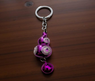 Llavero Wu-Lou color violeta con cascabel feng shui