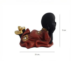 Imagen con medidas de la figura de Buda tumbado: 15 cm de largo x 9 cm de alto
